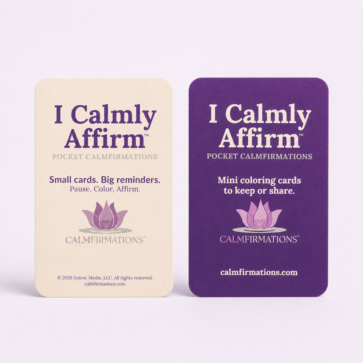 Two Calmfirmations pocket affirmation cards shown side by side on a light lavender background. The left card is cream with purple text and a purple lotus illustration, reading 'I Calmly Affirm'.